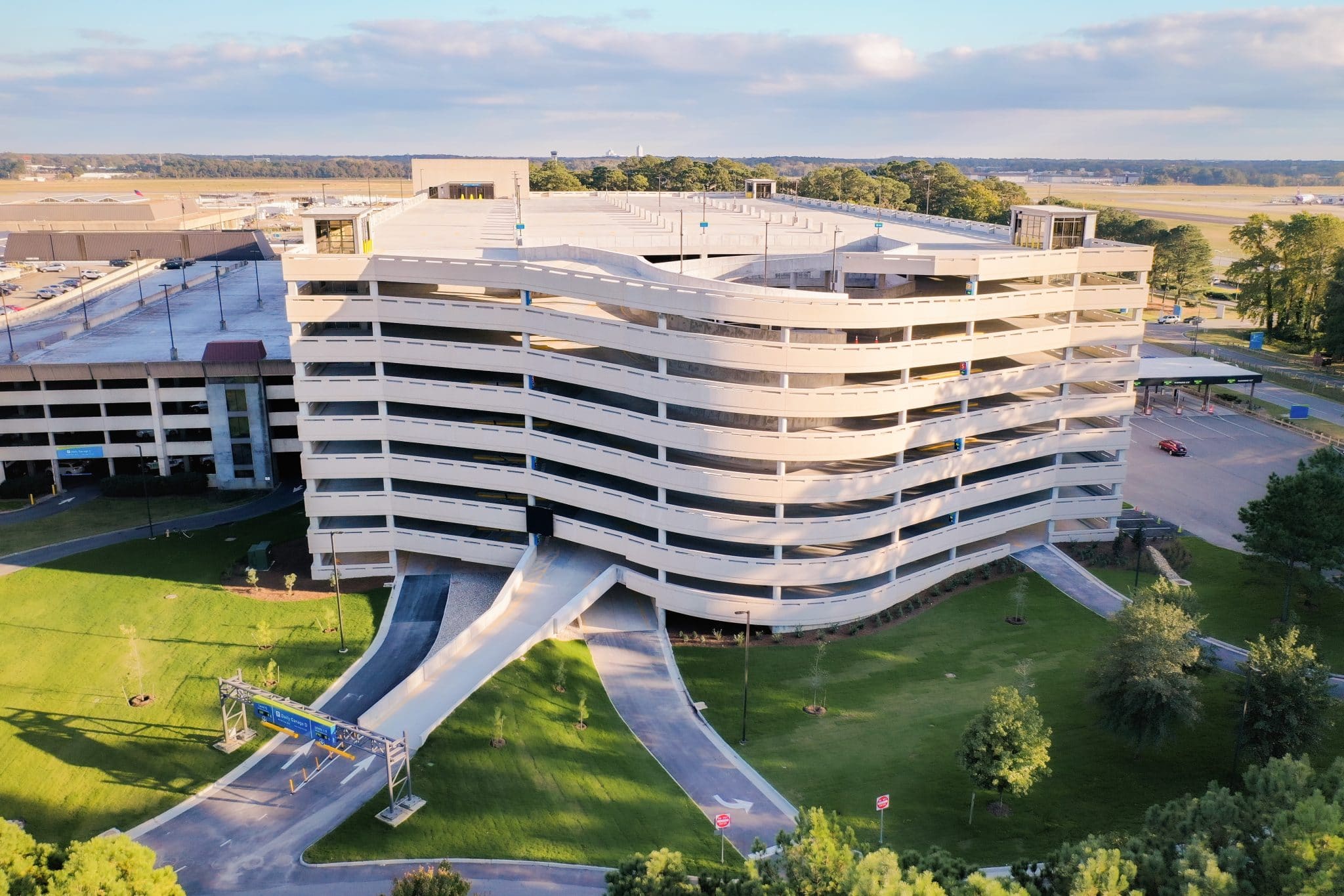 A 9 story parking deck with a rounded front wall.